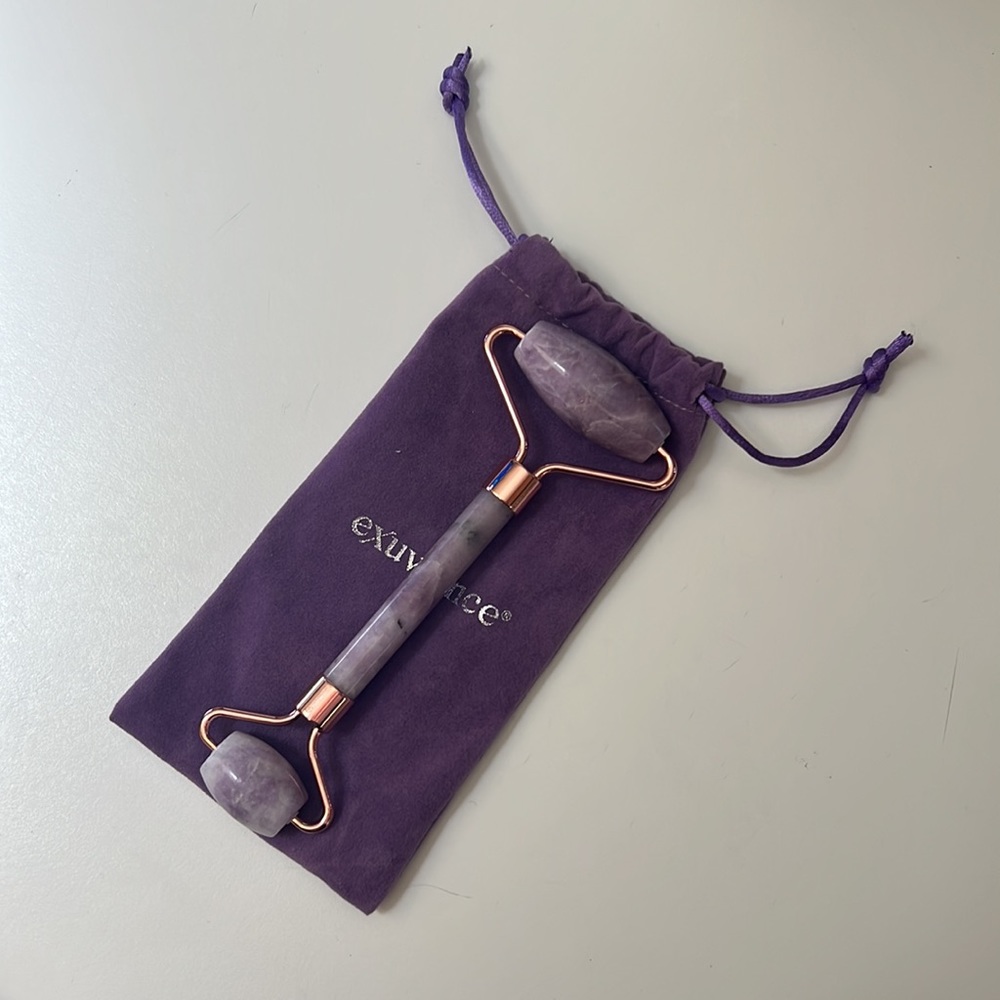 New Exuviance Stone Facial Roller